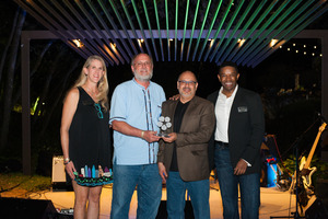 Cliff Tyllick with award from KeepAustinBeautiful
