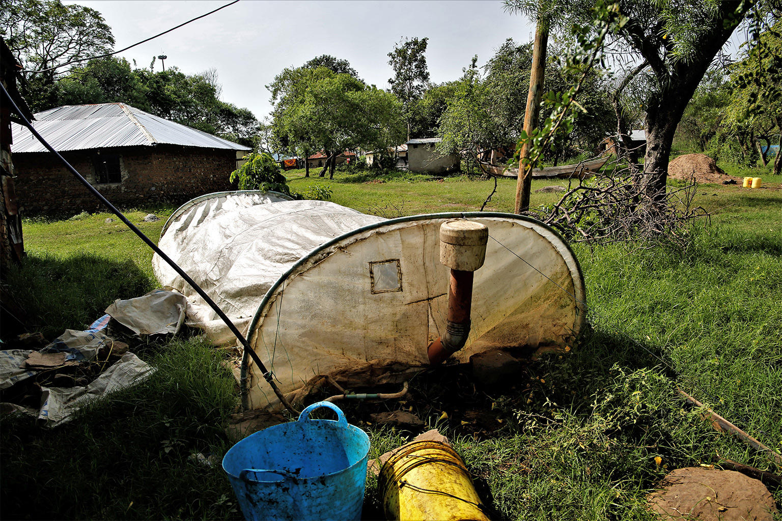 biogas digester unit installed a a Dunga village household. used for cooking. credit Anthony Langat